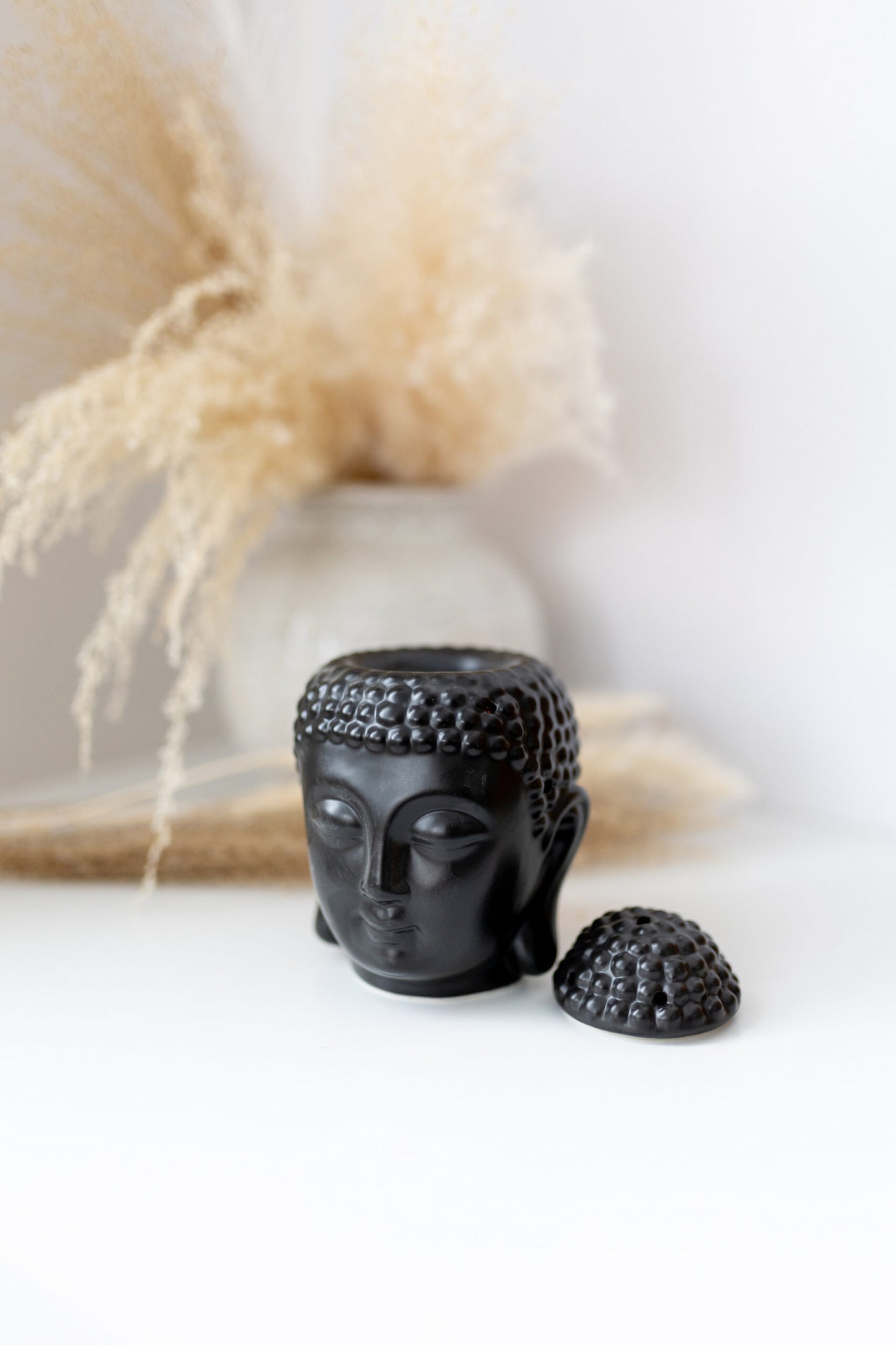 Brûleur de cire en forme de Bouddha