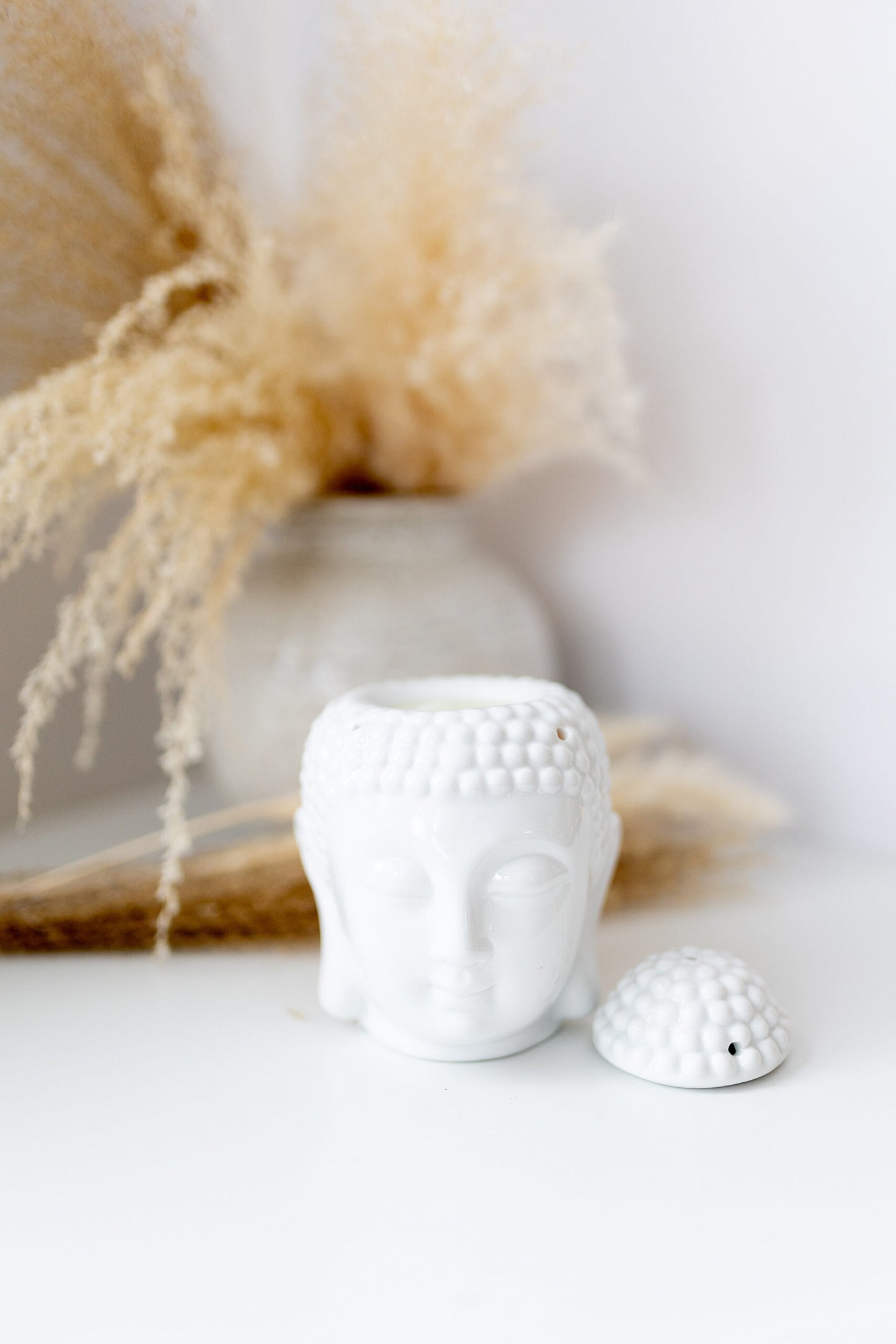 Brûleur de cire en forme de Bouddha